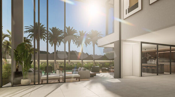 área externa da casa com piscina e área gourmet com palmeiras e espaço com sofás