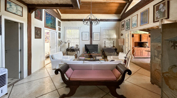 Imagem da sala da casa linear à venda na Muller Imóveis de luxo RJ - Recreio
