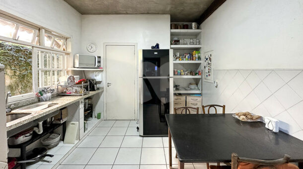 Imagem da cozinha da casa linear à venda na Muller Imóveis de luxo RJ - Recreio