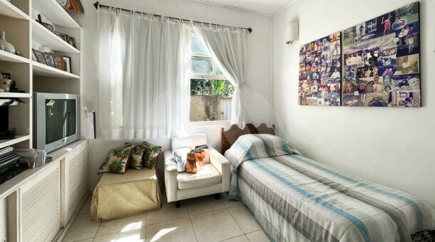 Imagem da segunda suíte da casa linear à venda na Muller Imóveis de luxo RJ - Recreio