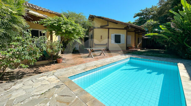 Imagem da área da lazer com piscina da casa linear à venda na Muller Imóveis de luxo RJ - Recreio