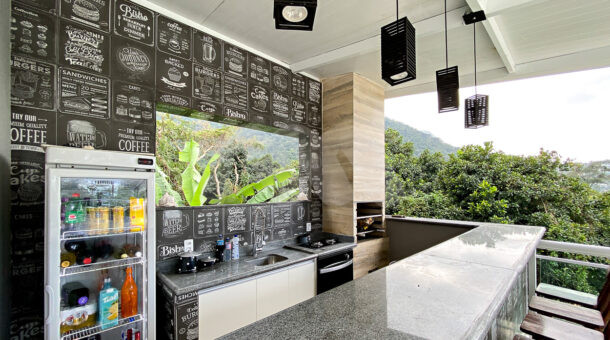 imagem da área gourmet da casa contemporânea em São Conrado à venda