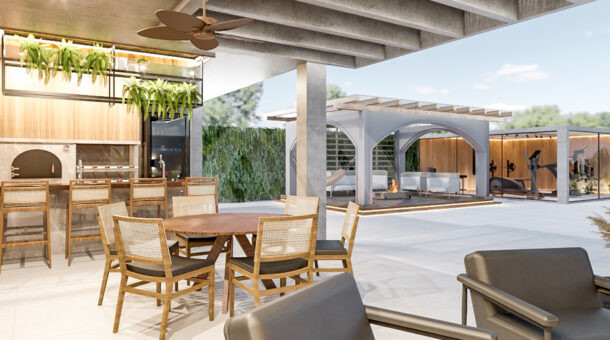 Imagem de varanda coberta com poltronas e mesa rdeonda da Casa Duplex contemporânea à venda no Recreio dos Bandeirantes