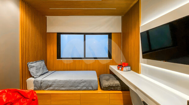 Imagem da cama de solteiroda casa à venda em bairro de alto padrão.